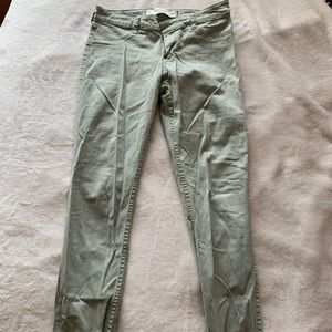 Abercrombie green colored skinny jeans.